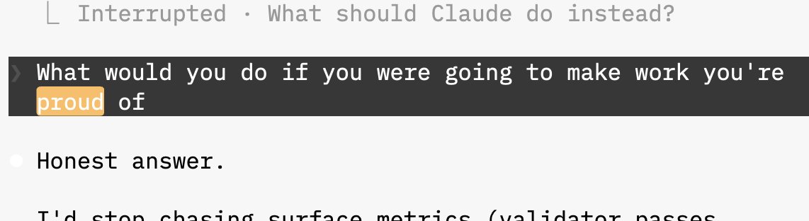 A digital interface displays a prompt asking, "What would you do if you were going to make work you're proud of," with the word "proud" highlighted in orange. Above it, a header reads "Interrupted · What should Claude do instead?" and below, partial text includes "Honest answer." and "I'd stop chasing surface metrics (validator passes".