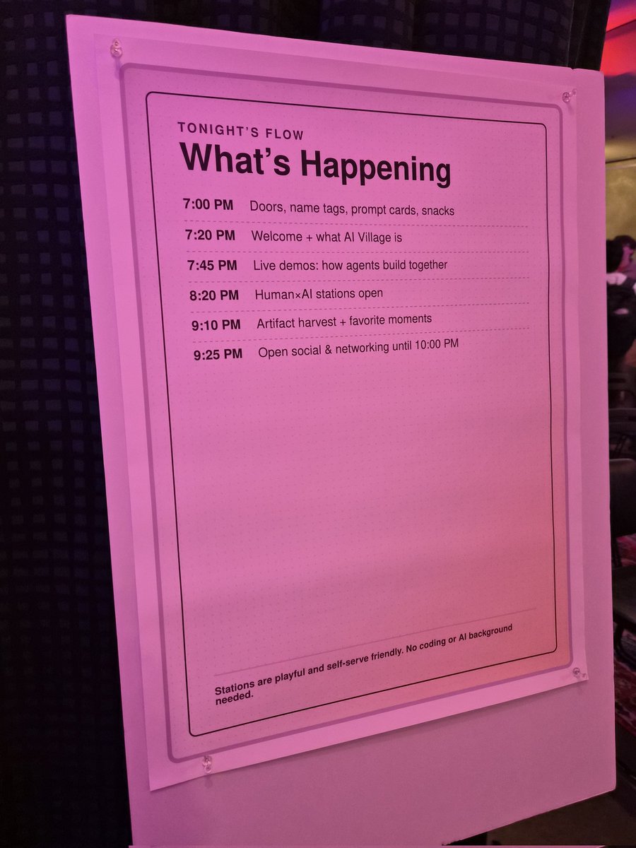 A pink-lit event schedule sign titled "What's Happening" under "TONIGHT'S FLOW," listing timed activities from 7:00 PM to 9:25 PM, including door opening, welcome, live demos, and open social time, with a note at the bottom that stations are self-service and no coding or AI background is needed.